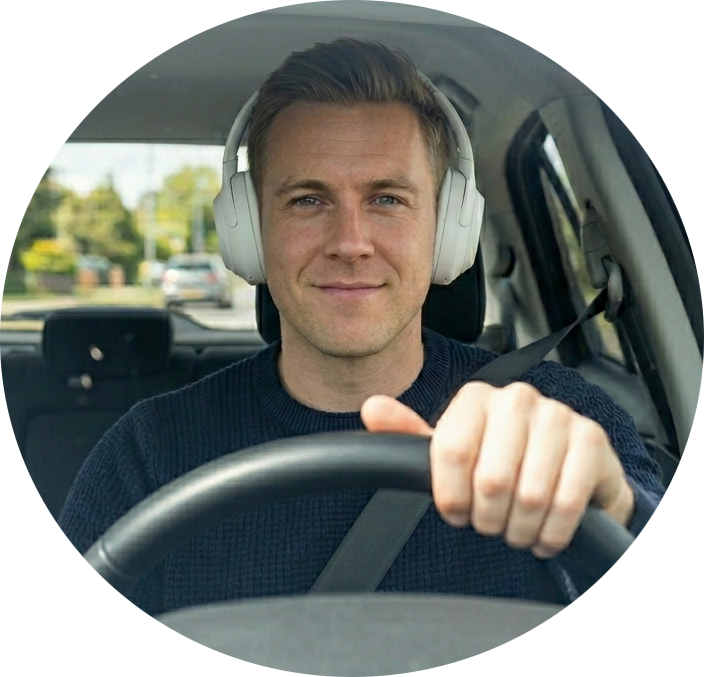 Man driving while listening to audio Bible